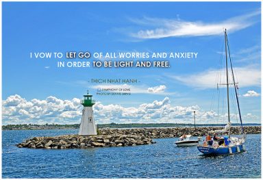A photo of a lighthouse and sailboat that says I vow to let go of all worries and anxiety in order to be light and free acts as inspiration to stay clean and serene