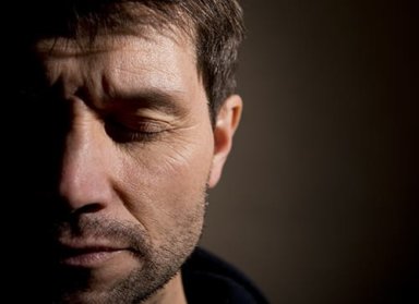 man suffering from one of the many leading causes of ptsd