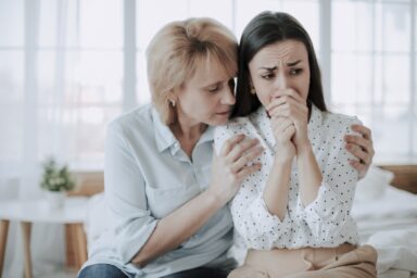 Mother supporting a daughter with a mental health issue